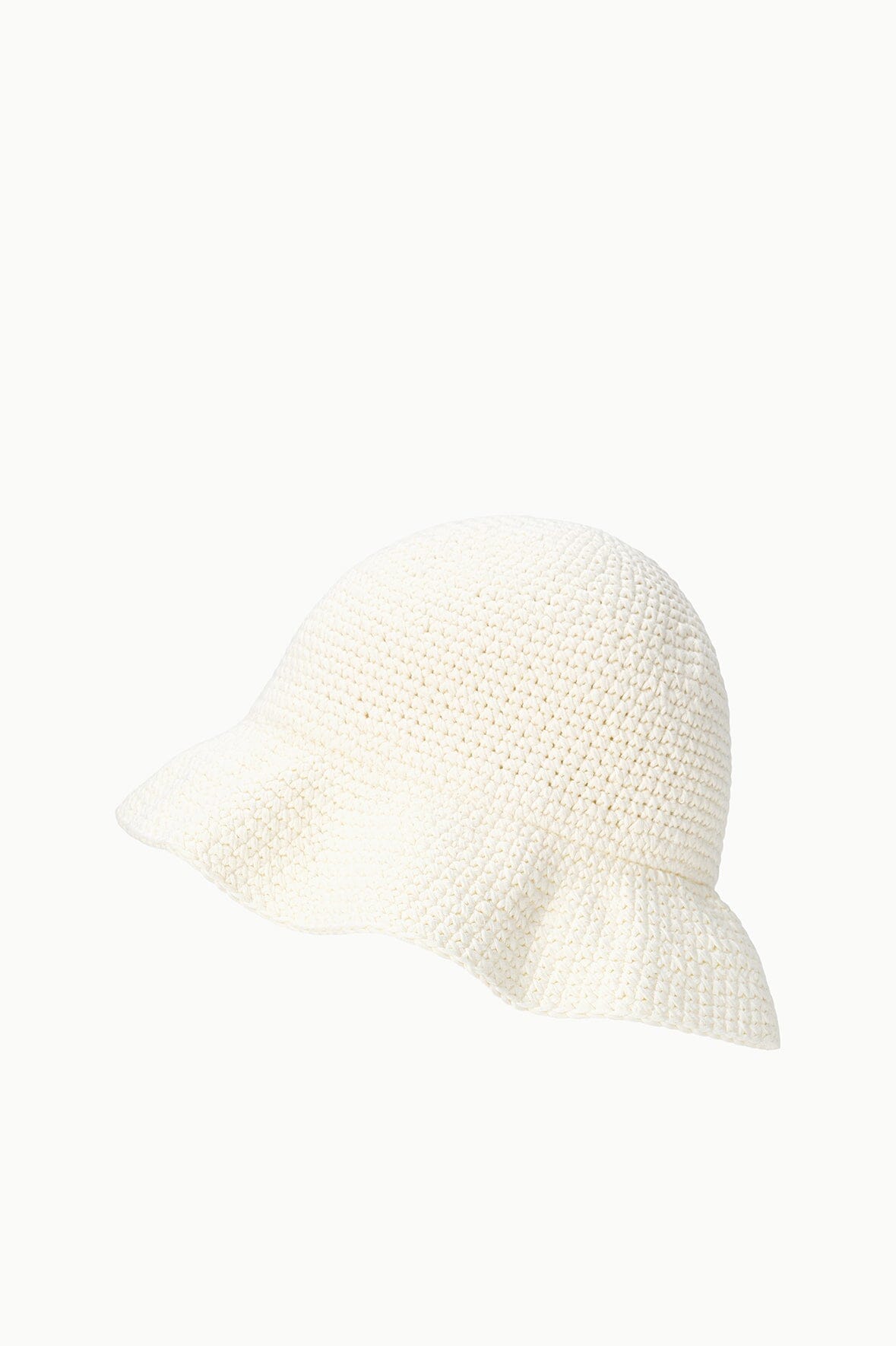 Off-white crochet bucket hat with wide brim; side view of textured knit.