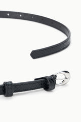 Black textured belt with silver buckle and stitched keeper