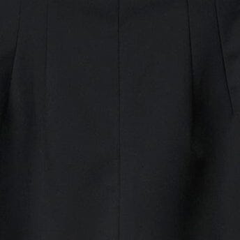 Black shorts close-up with vertical seam detailing at the front