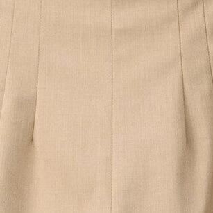 Close-up of stone-tan woven fabric texture on women’s shorts