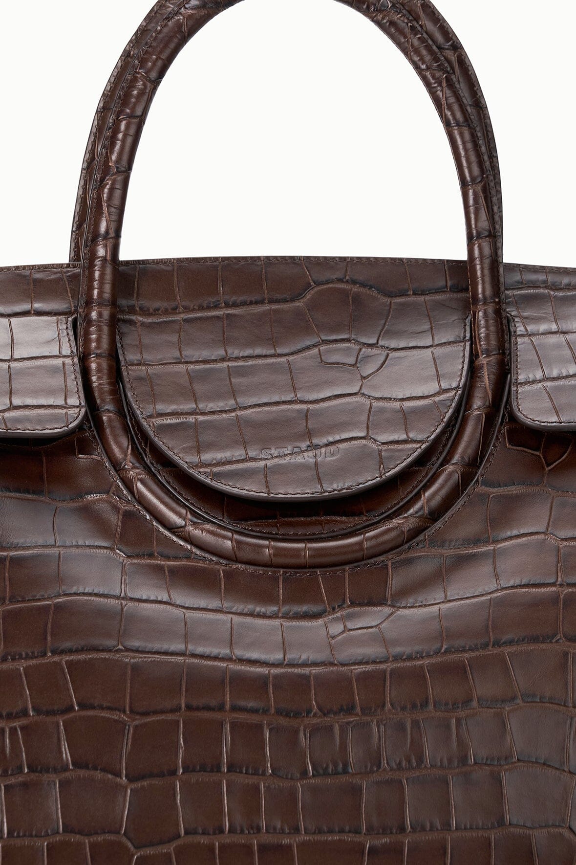 Croc-embossed leather carryall with oval top handle and textured front