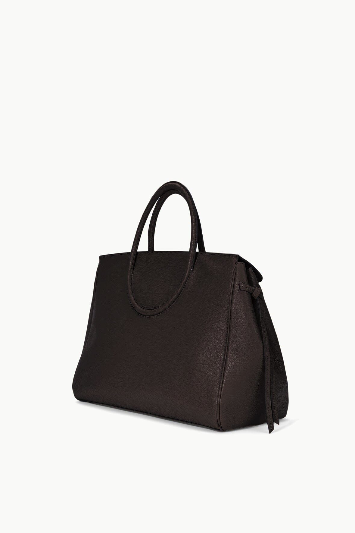 Espresso brown leather carryall bag with top handles and side details, angled view.