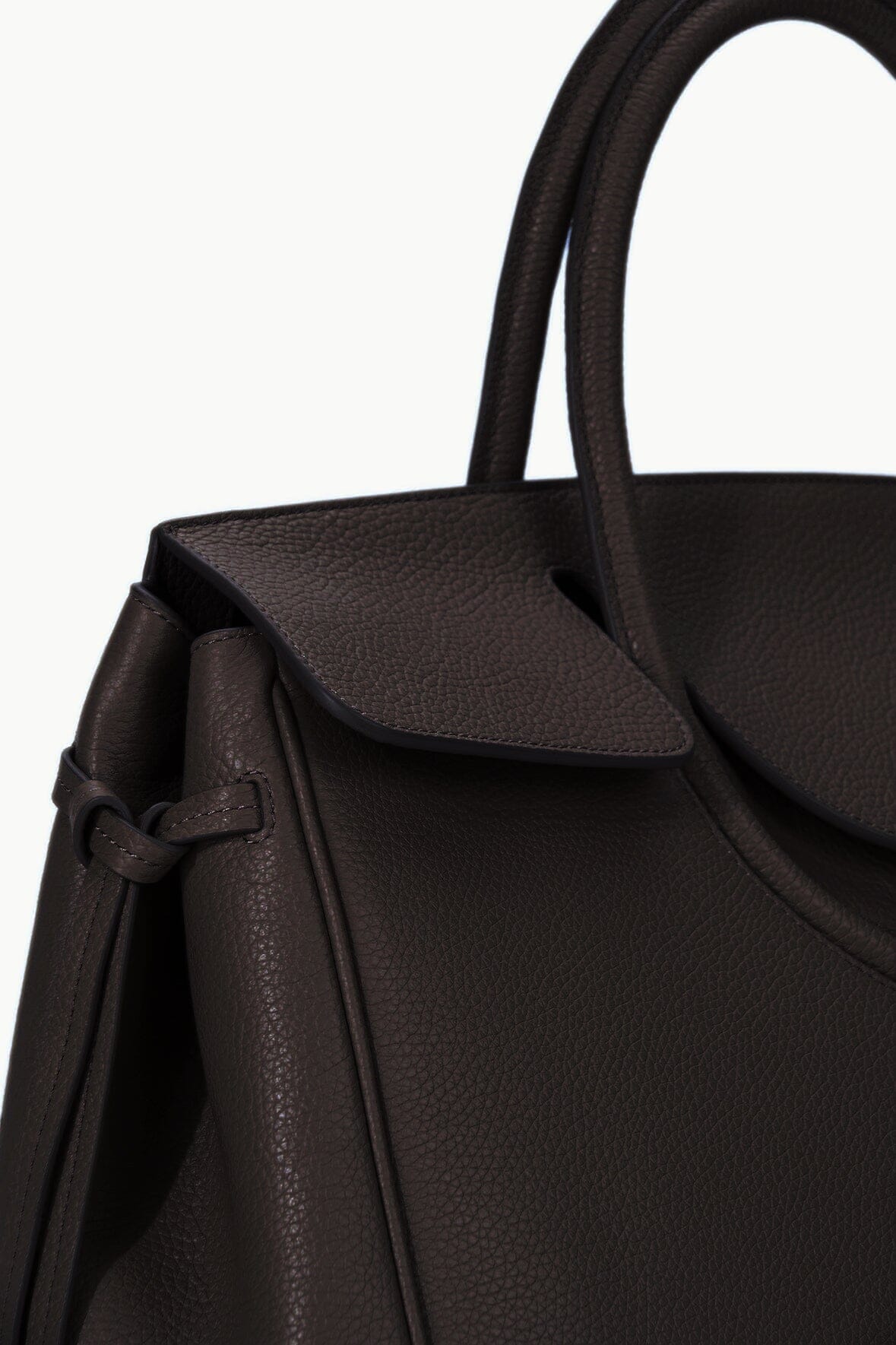 Espresso brown textured leather carryall with top handles and front flap clasp.