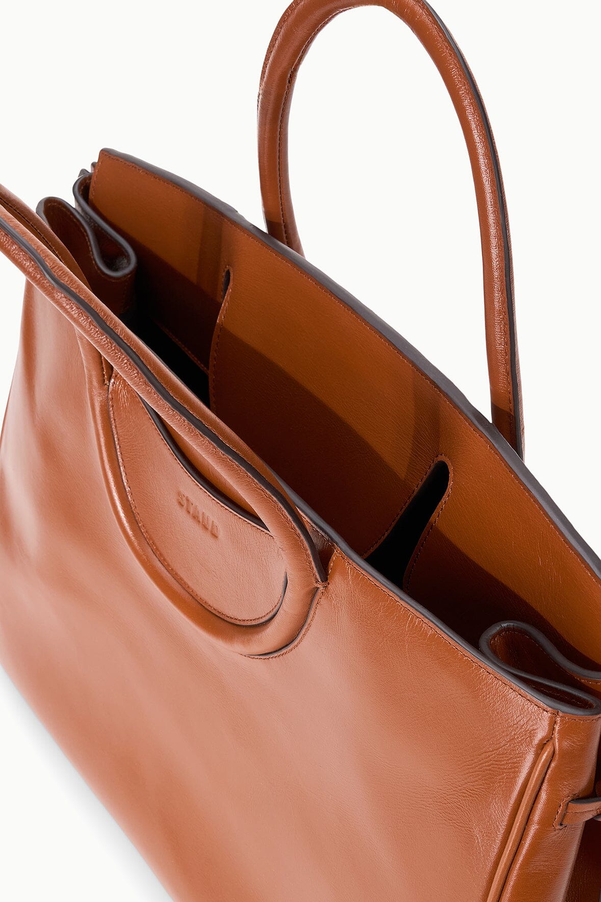 Tabac leather carryall bag open top with divided interior and hanging zipper pocket