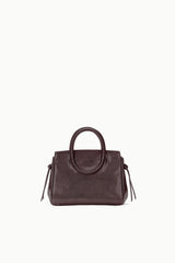 Espresso mini carryall handbag with rounded top handle and circular front plate