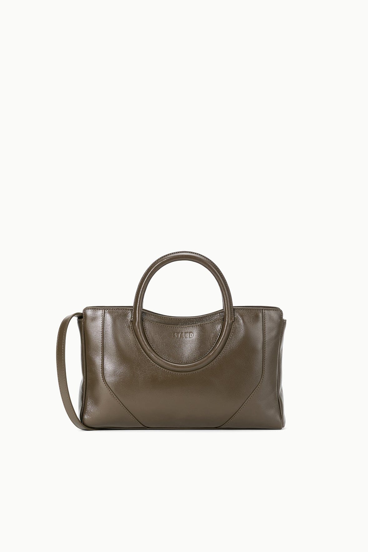 Truffle brown mini satchel with oval top handle, side strap, and zip-top style