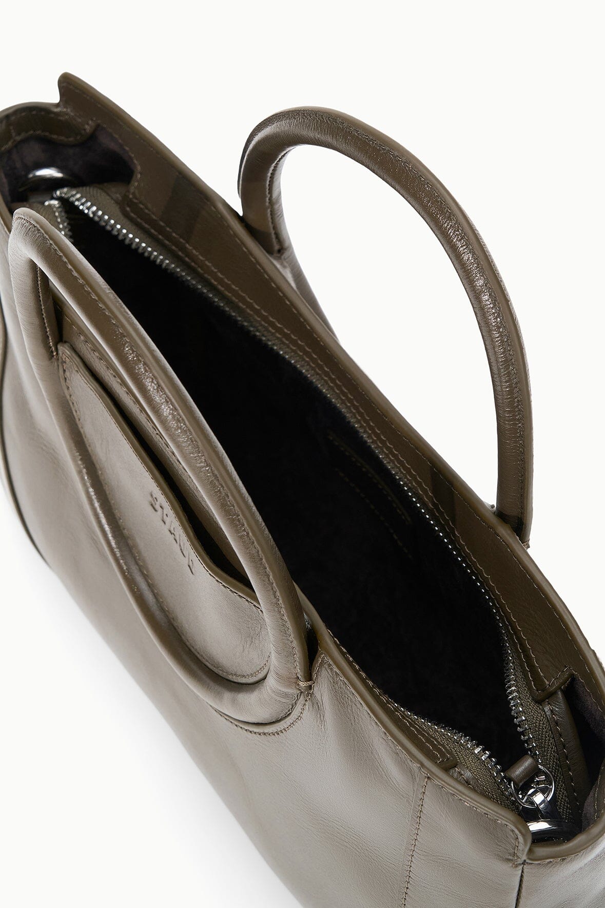 Truffle brown mini satchel interior view with zipper pocket and smooth lining
