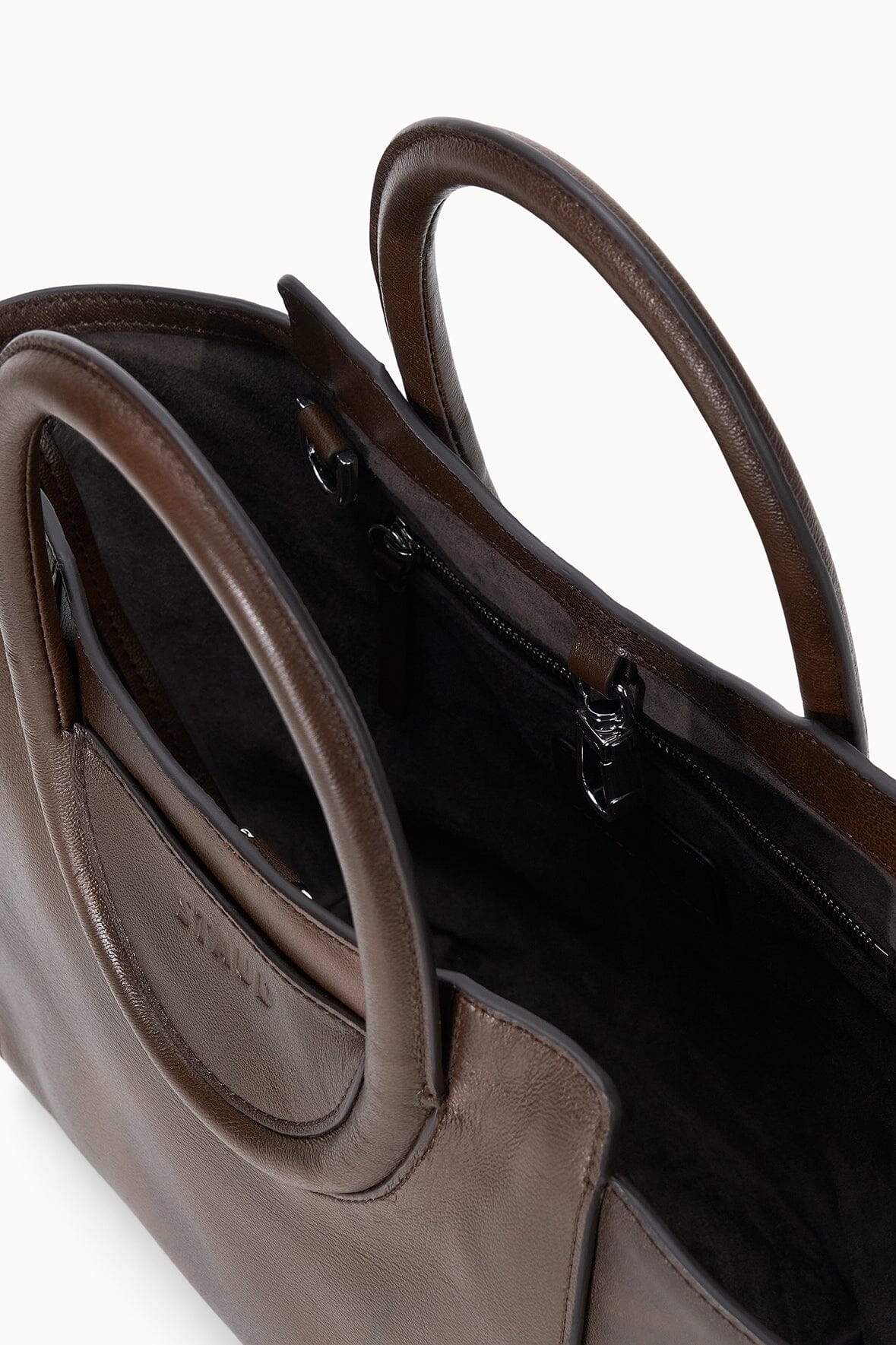 MAUDE mini tote side view with black interior and top zipper, espresso distressed brown