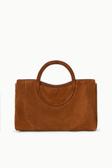 Brown suede satchel with double top handles and front gusset, structured standalone design