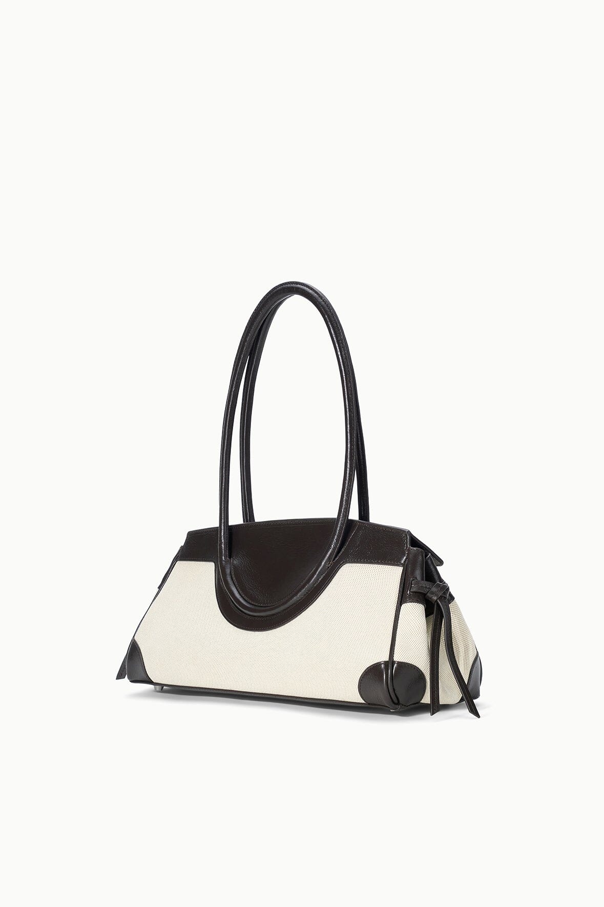 Maude shoulder bag with natural canvas body and espresso leather handles, side strap detail