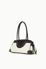 Maude shoulder bag with natural canvas body and espresso leather handles, side strap detail