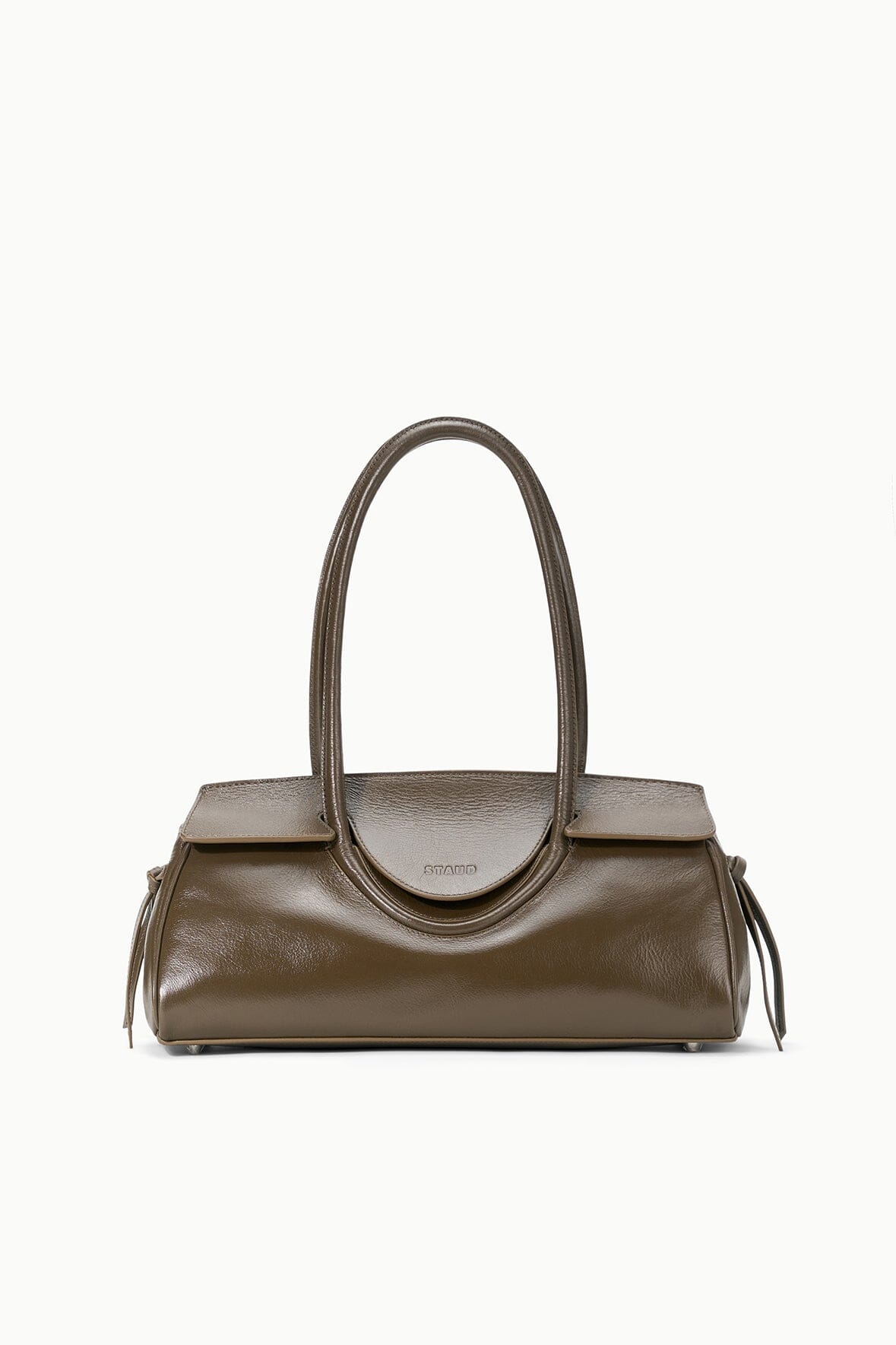 Truffle Maude shoulder bag in brown leather with curved handle and embossed logo trim
