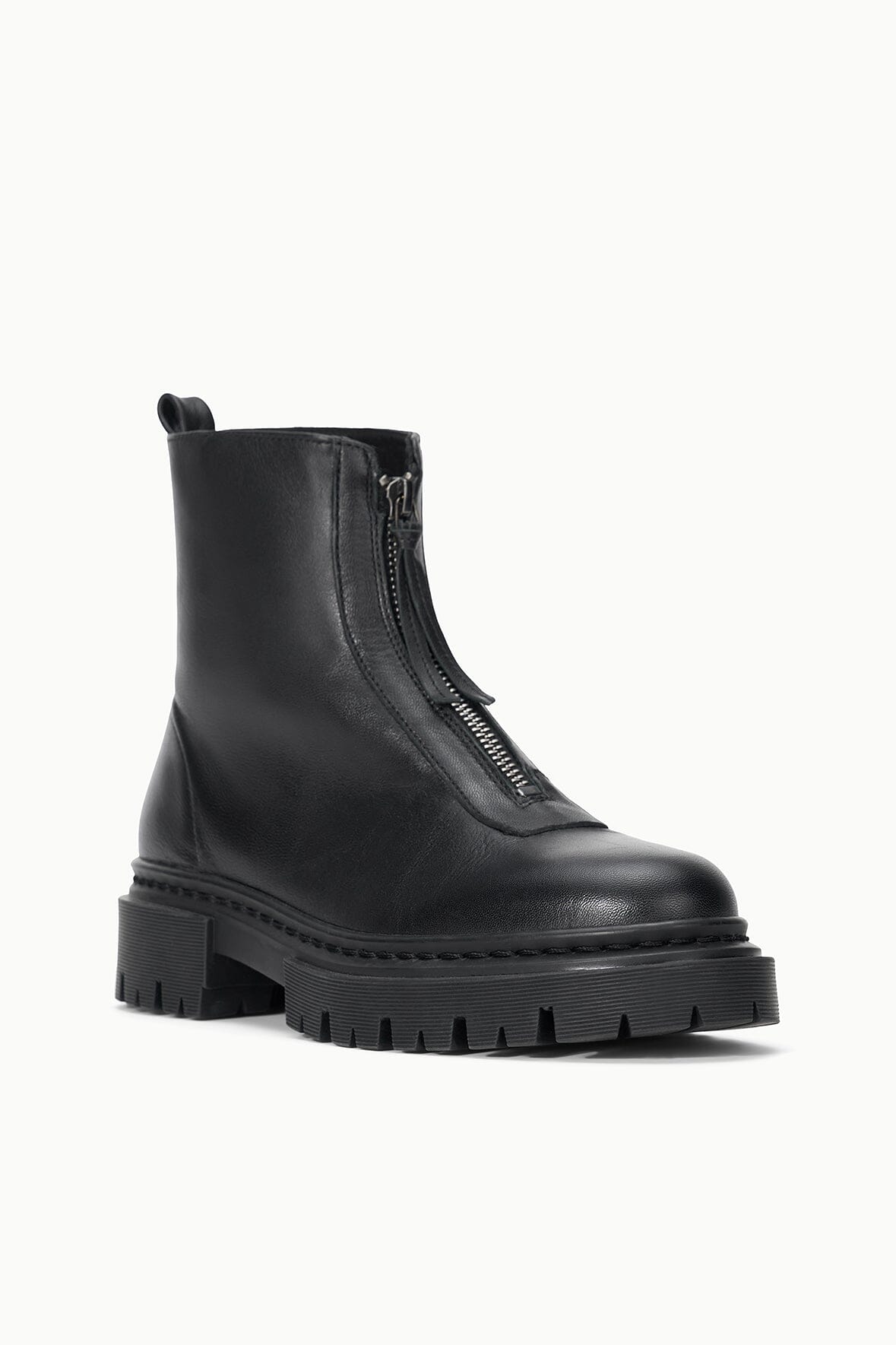 Black ankle boot with side zipper, pull tab, and thick lug sole.