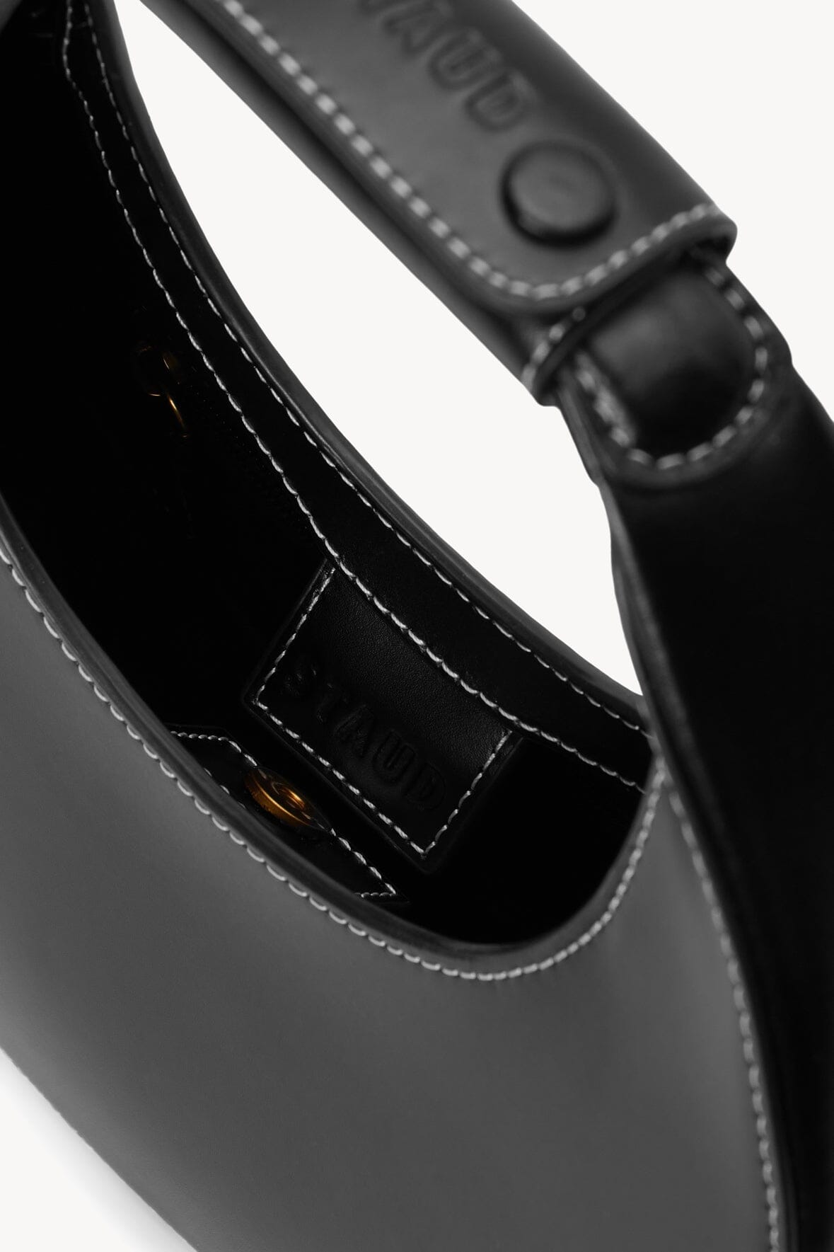 Black mini moon bag interior pocket and stitched trim