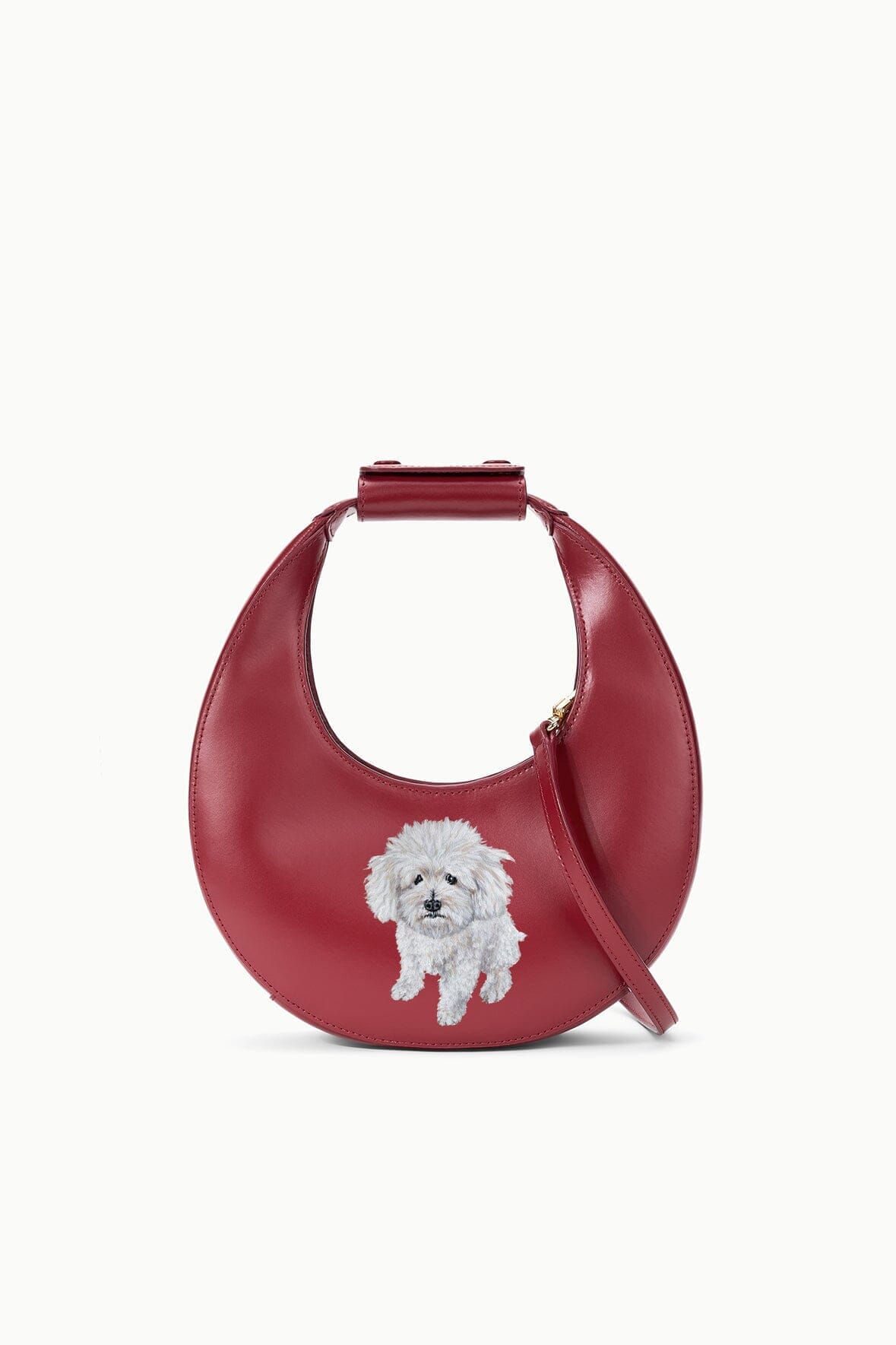 Maroon mini moon bag with top handle, side strap, and custom dog face patch