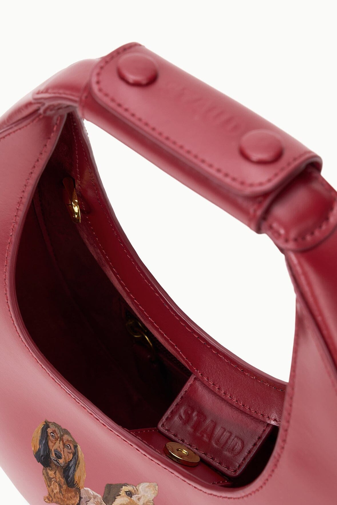 Maroon mini moon bag interior with custom pet photo panel and gold hardware