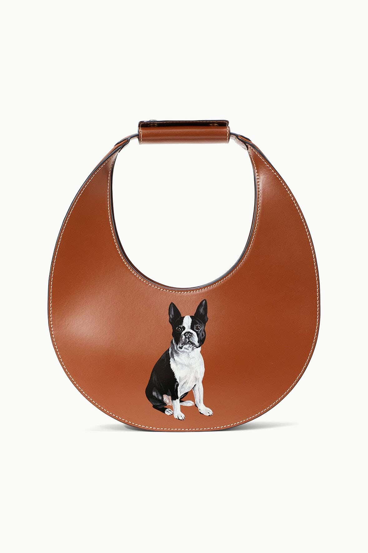 Tan leather moon pet bag with photo of one dog on front