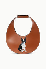 Tan leather moon pet bag with photo of one dog on front
