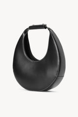 Black moon-shaped leather bag with top handle and stitched curved design