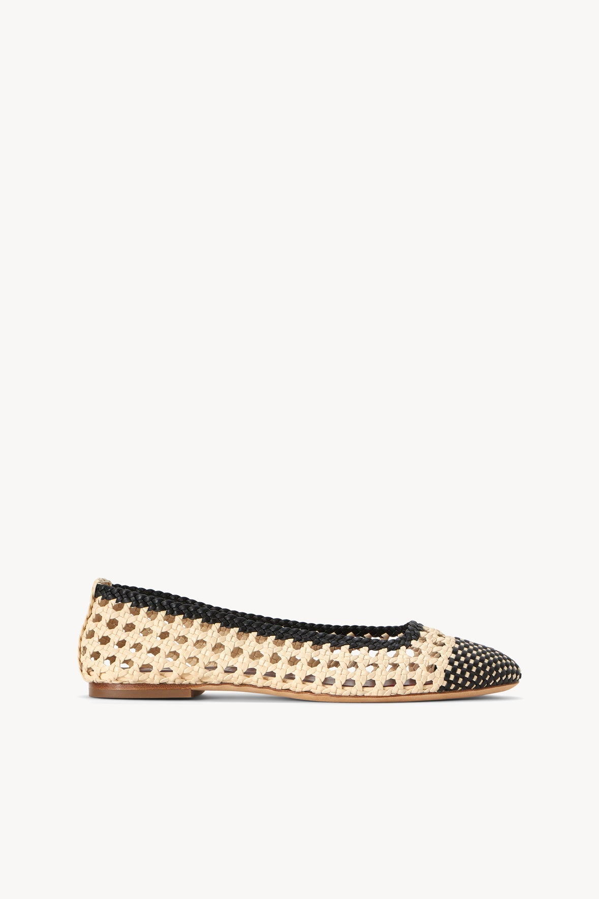 Cream and black crochet ballerina flats, profile side view