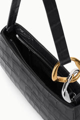 Black croc-embossed hobo bag showing interior zip pocket and ring hardware