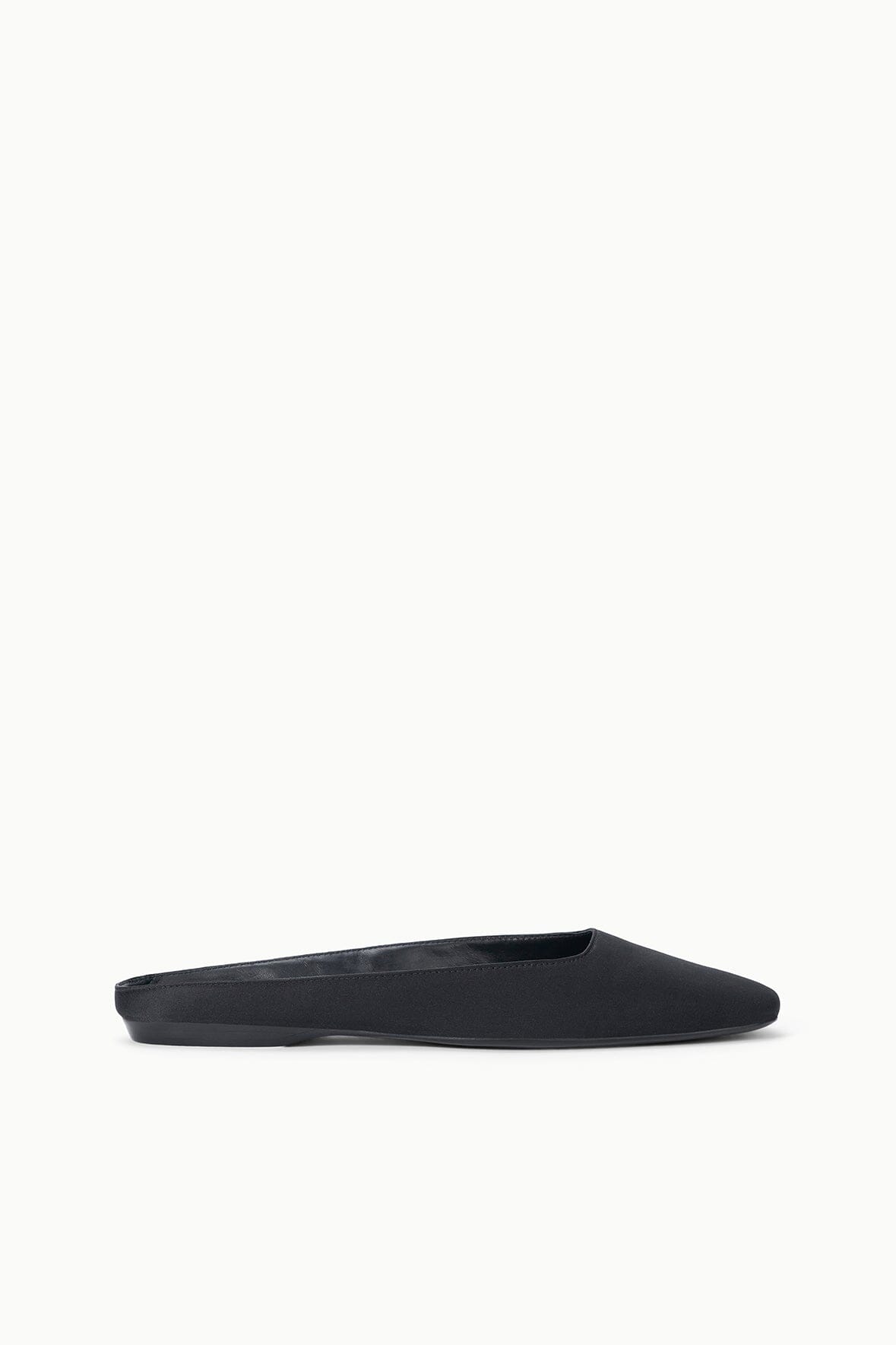 Black flat mule with low slip-on profile and smooth upper