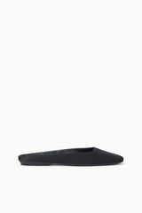 Black flat mule with low slip-on profile and smooth upper