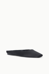 Black slip-on flat mule, side view with pointed toe