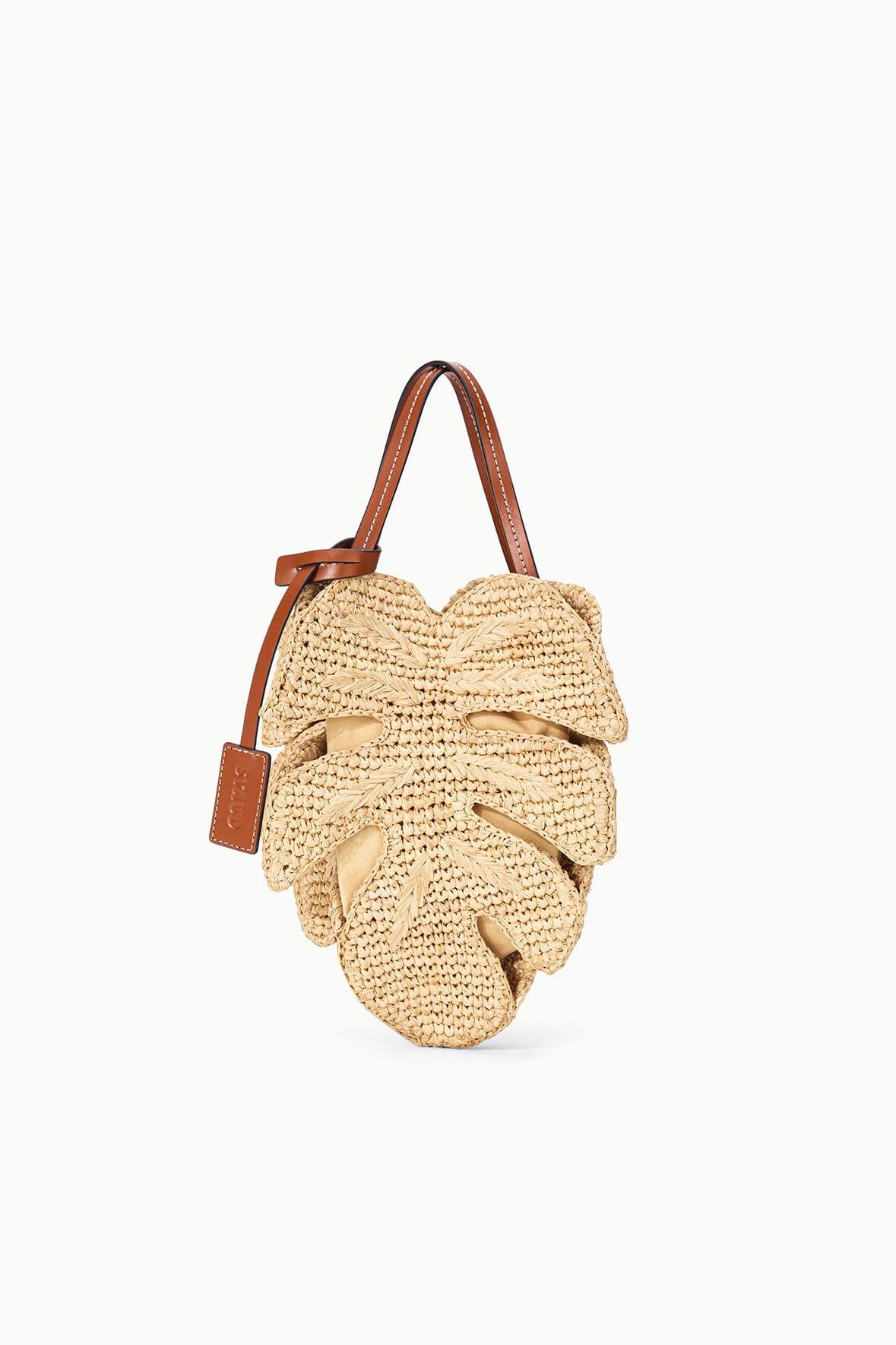 Natural tan raffia leaf-shaped shoulder bag with tan leather handles and tie closure