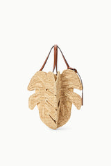 Natural tan leaf raffia bag with braided texture, tan leather trim, top handles