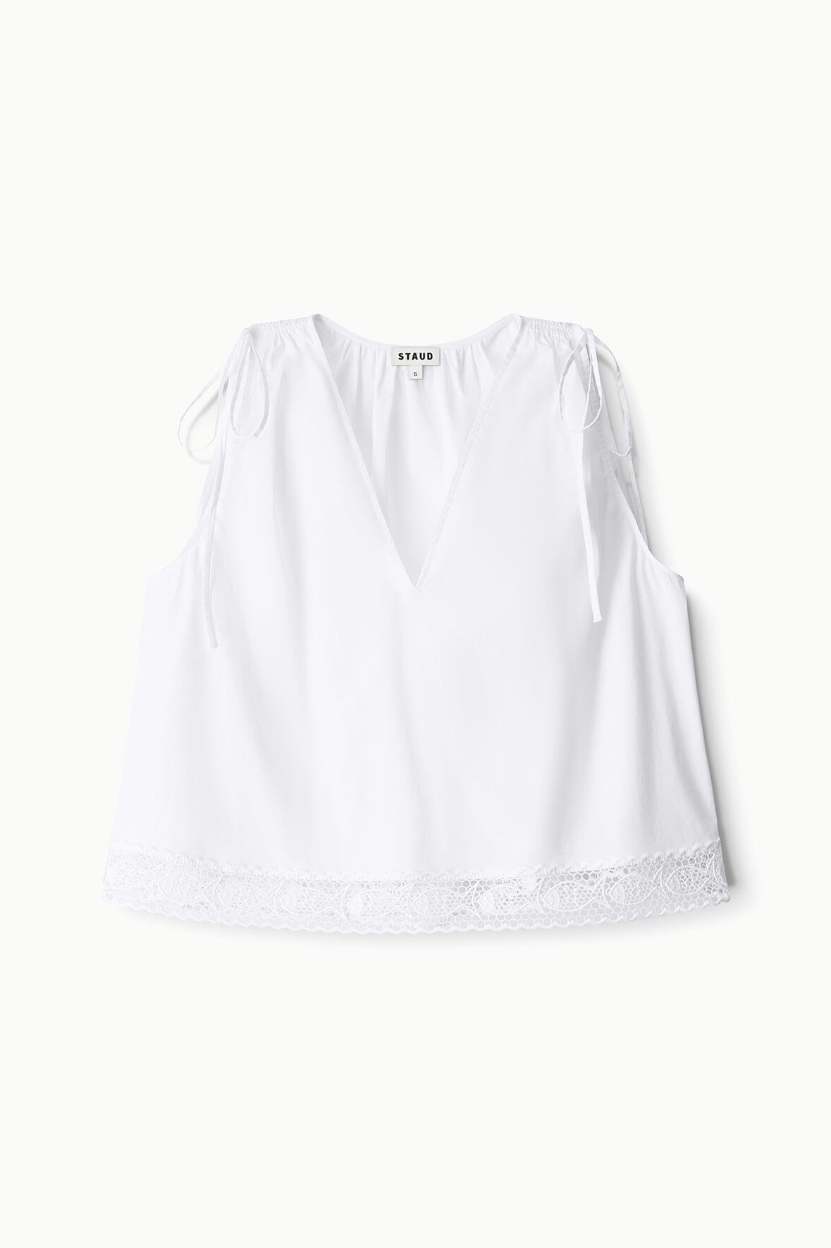 White sleeveless V-neck top with shoulder ties and lace-trim hem