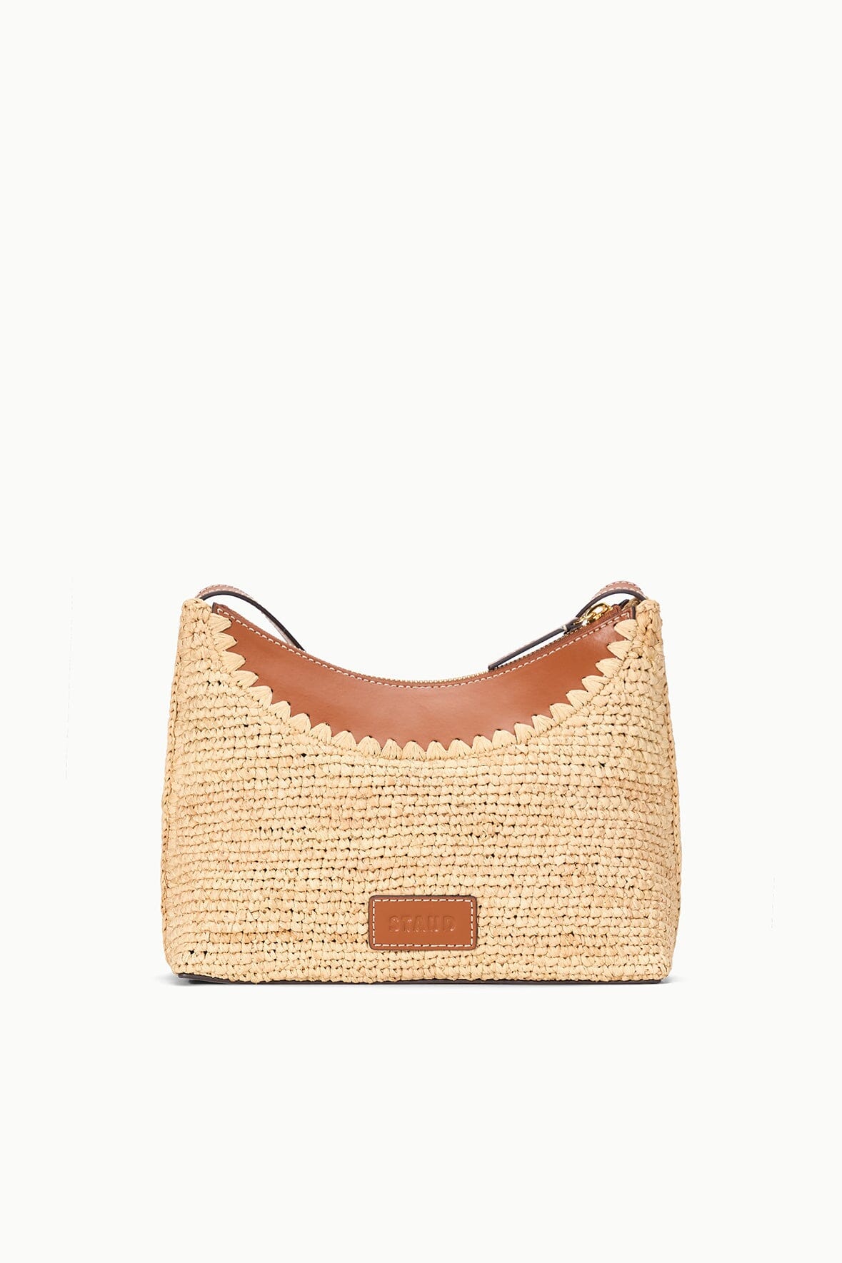 Natural tan raffia hobo bag with brown leather patch logo and curved top