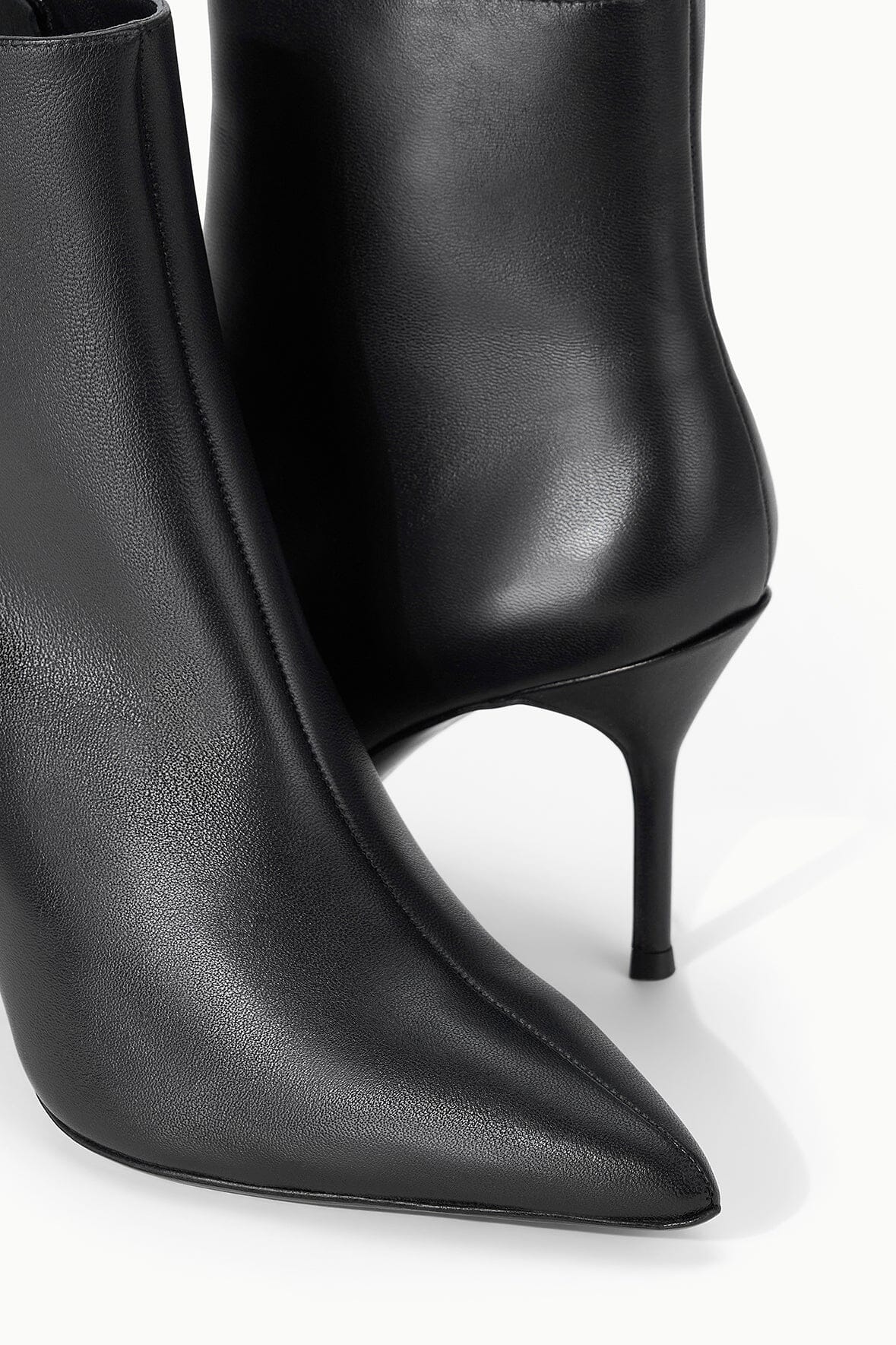 Black leather ankle boot upper with pointed toe and thin high heel