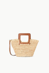 Natural tan raffia mini bucket bag with brown leather-look handle and shoulder strap