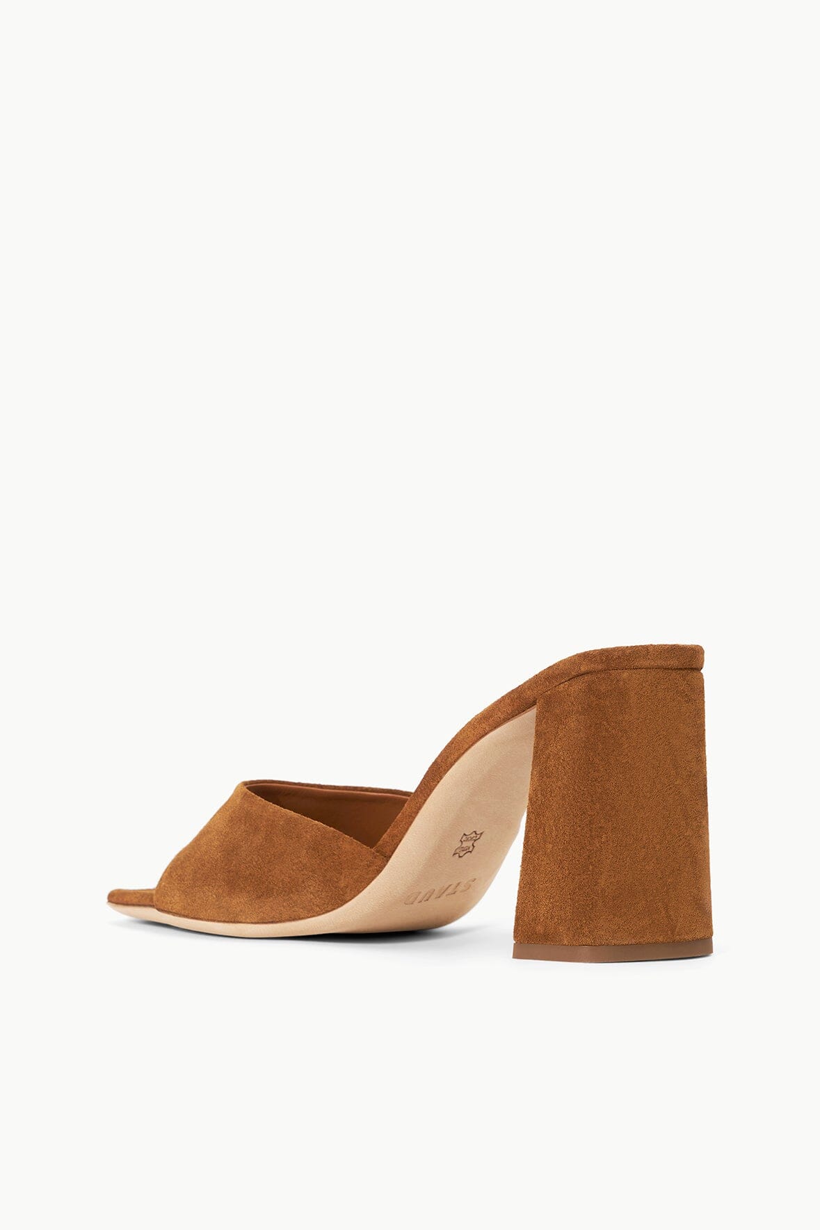 Tan suede heeled mule sandal angled view with open toe and block heel