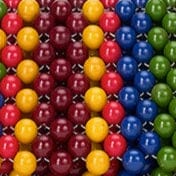 Close-up of multicolor bead pattern on shoulder bag