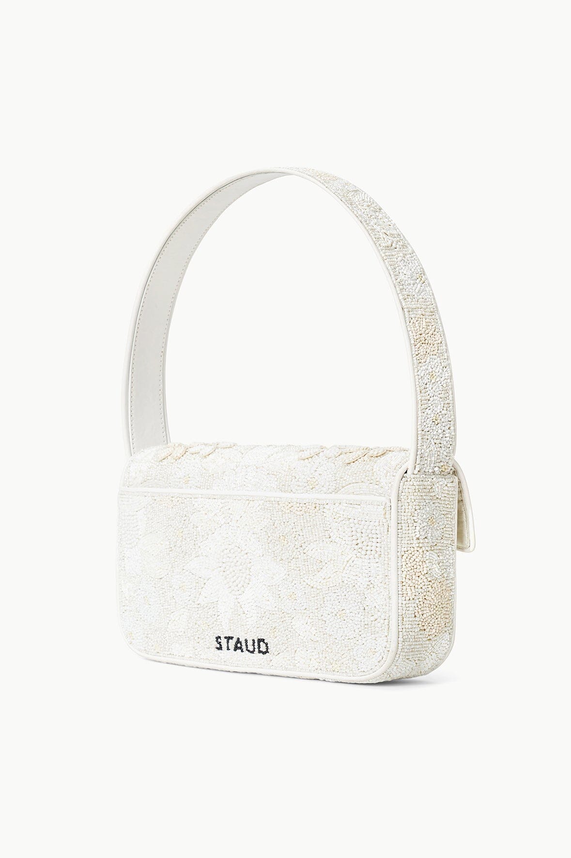 White beaded mini handbag with top handle and side strap detail, zipper closure.