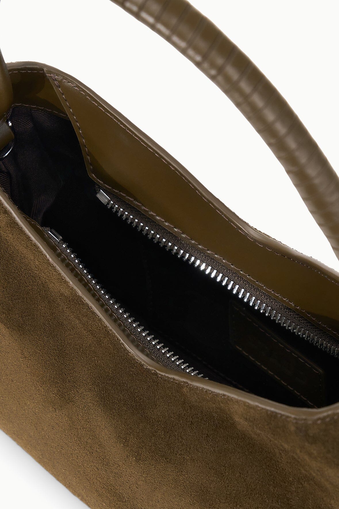 Truffle suede shoulder bag with open top, gold-tone zip, and dark fabric lining.