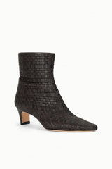 Single dark espresso woven leather ankle boot with pointed toe and low stacked heel