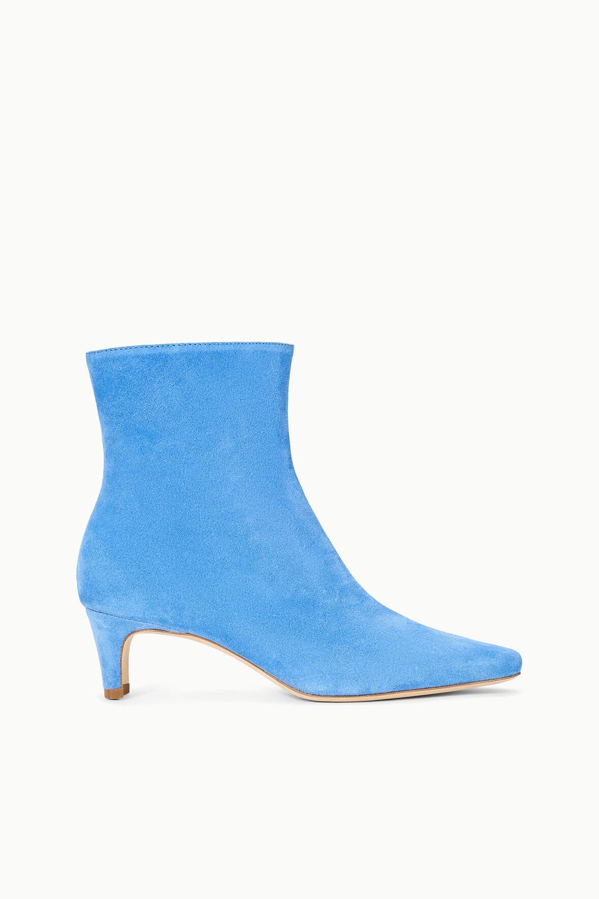 Blue suede ankle boot with mid-height heel and pointed-toe silhouette