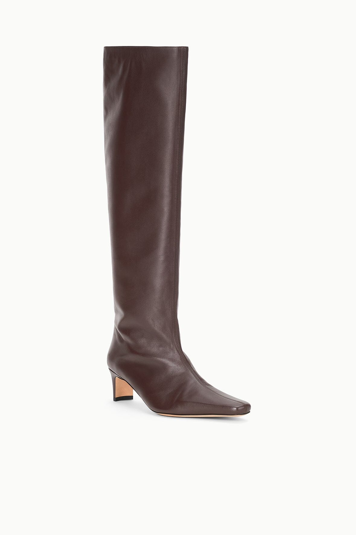 Espresso brown tall boot profile with pointed toe and low stacked heel