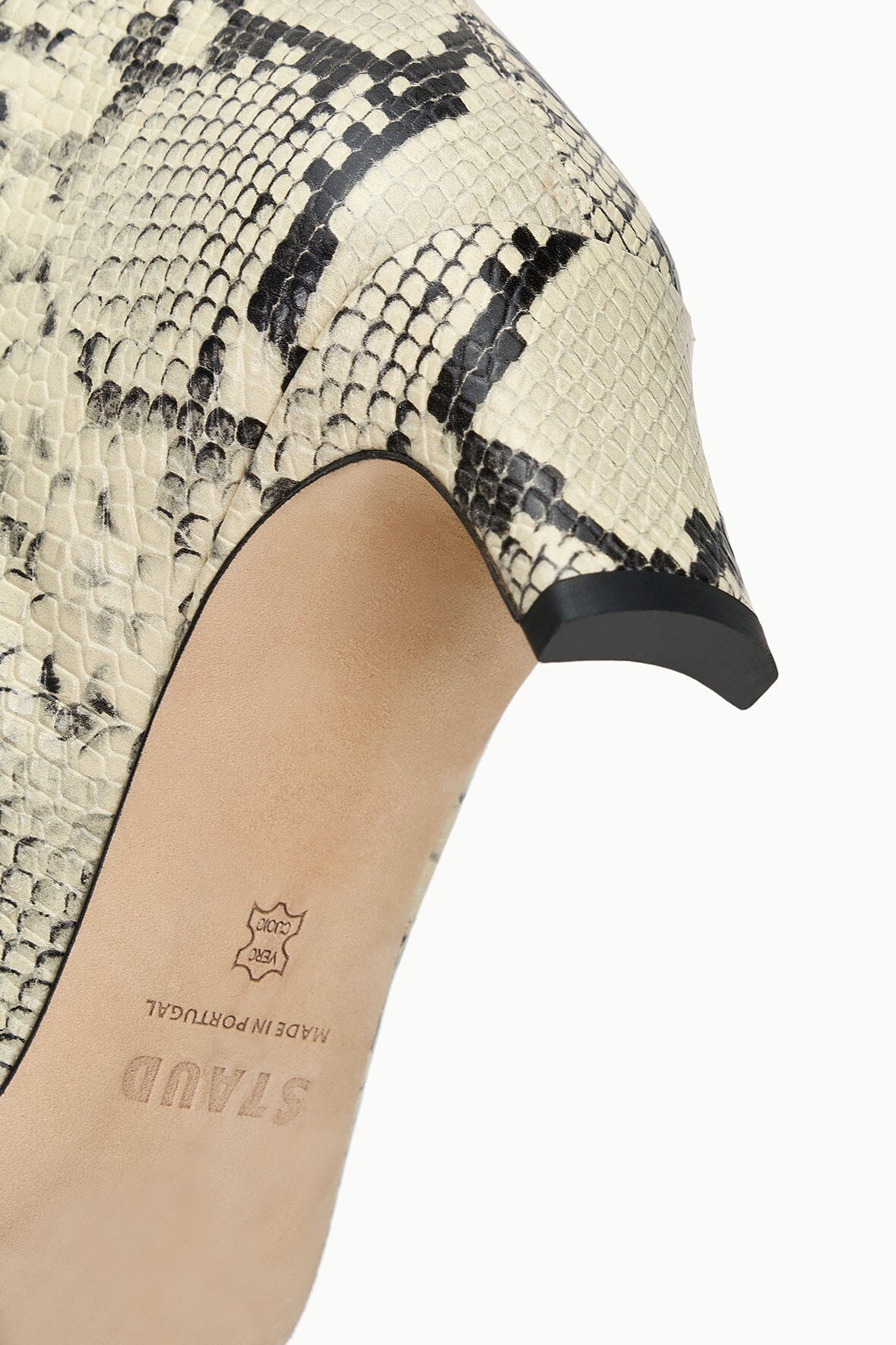 Snake-print knee-high boot with black heel trim and pointed toe