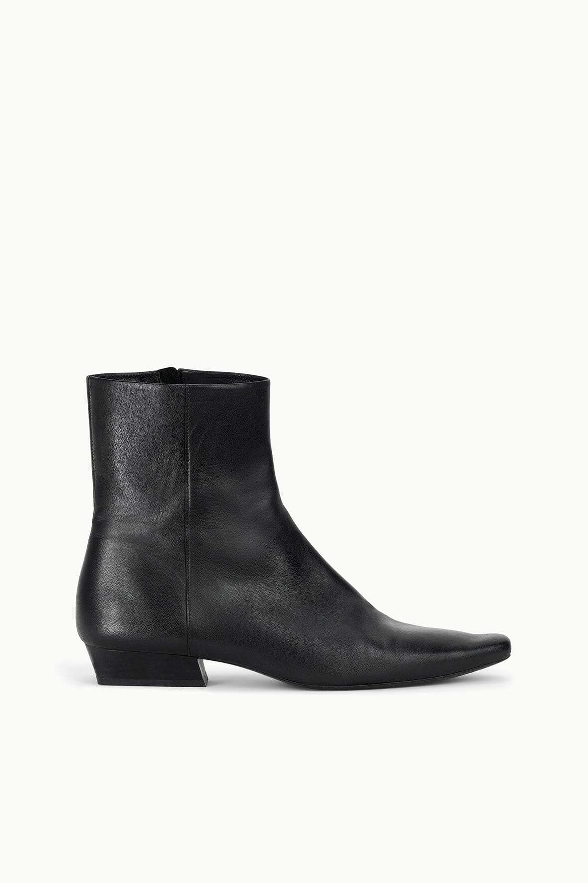 Black flat ankle boot with pull-on design and low block heel