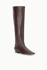 Tall espresso flat boot with pull-on shaft and low block heel