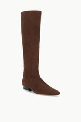 Wally flat suede boots in mahogany brown, angled view showing tall shaft.