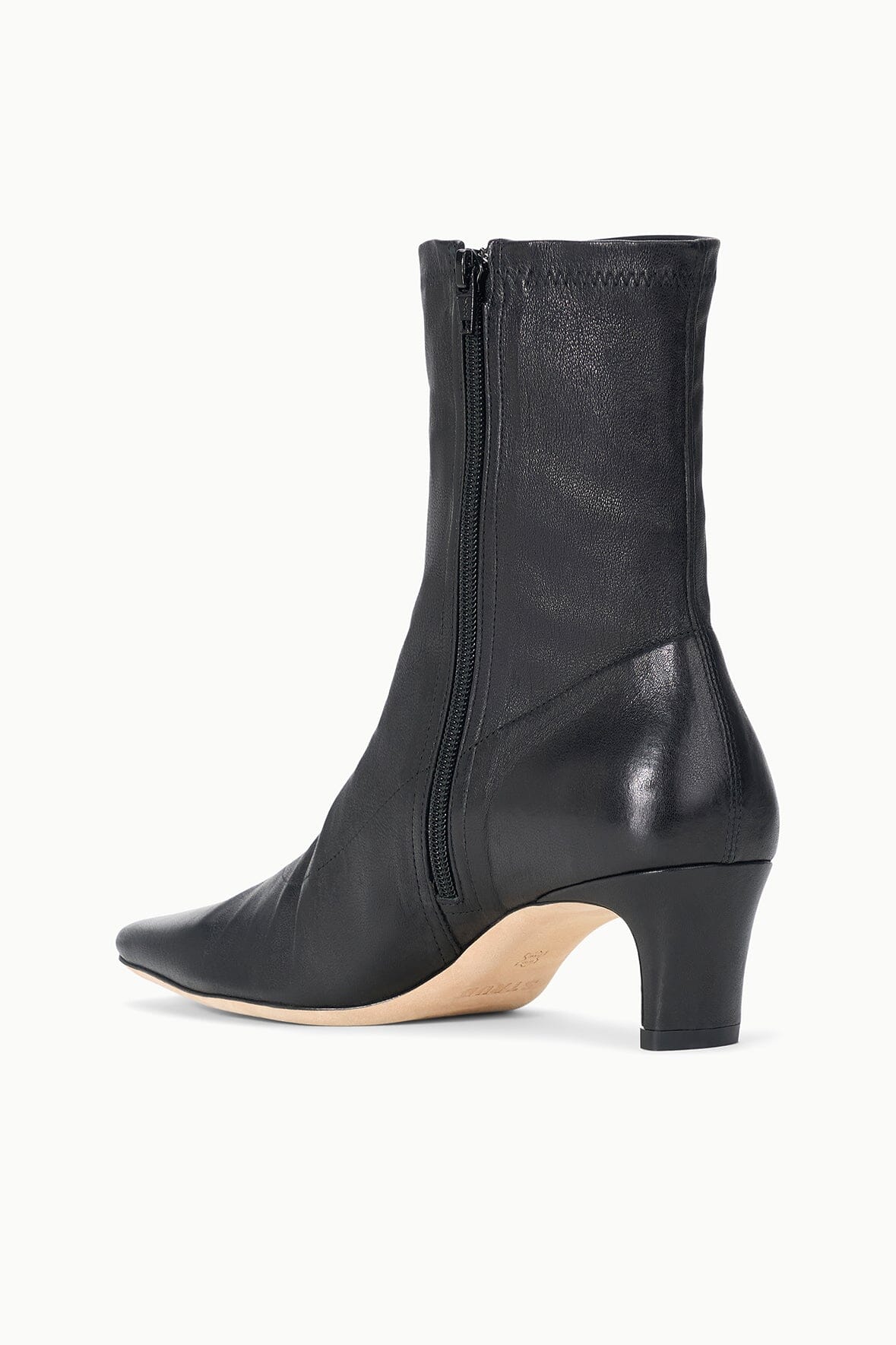 Black ankle sock boot with full side zipper and mid-height block heel.