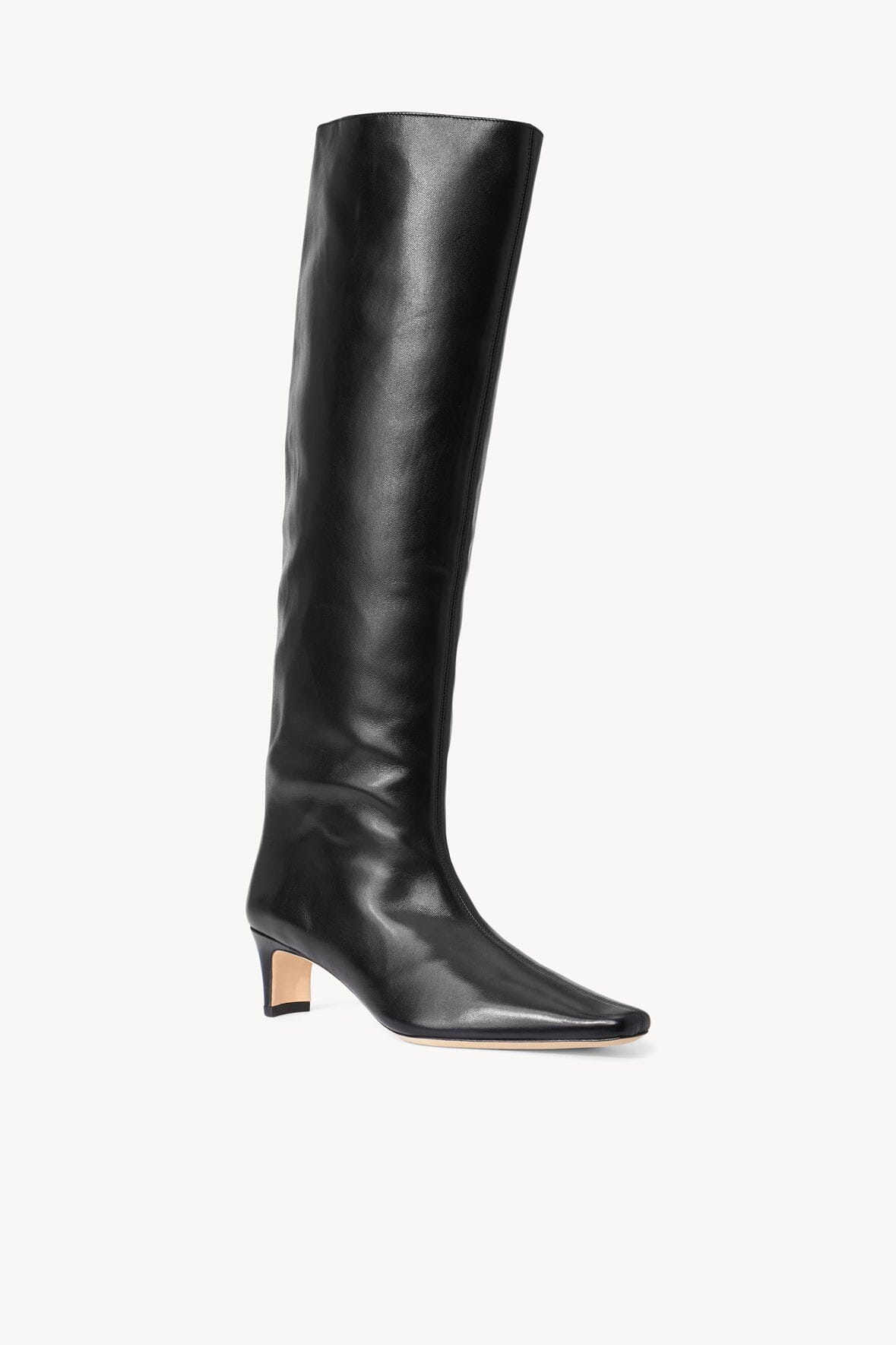 Black knee-high pull-on boot with pointed toe and low block heel
