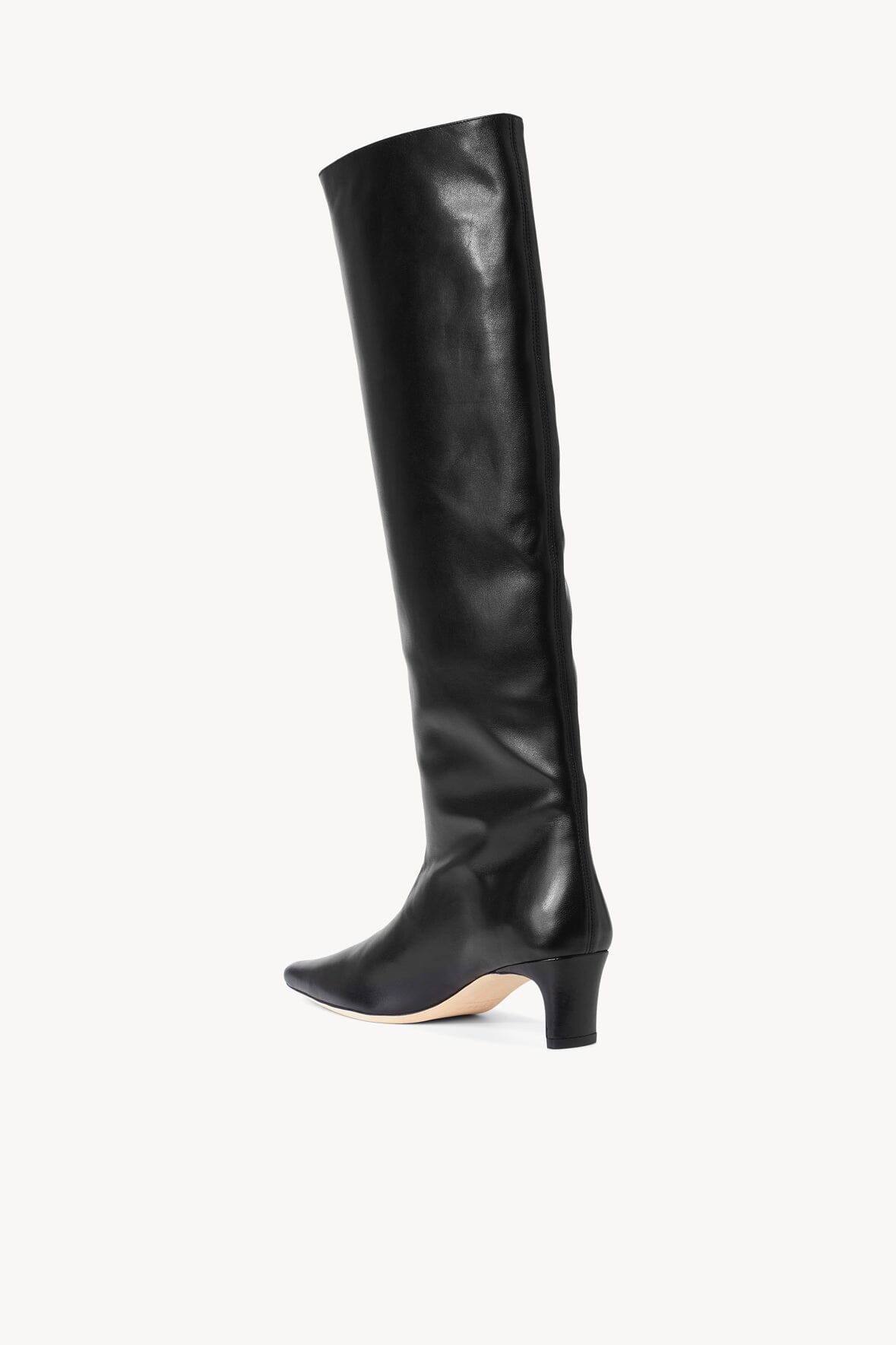 Black knee-high boot with pointed toe and low stacked block heel
