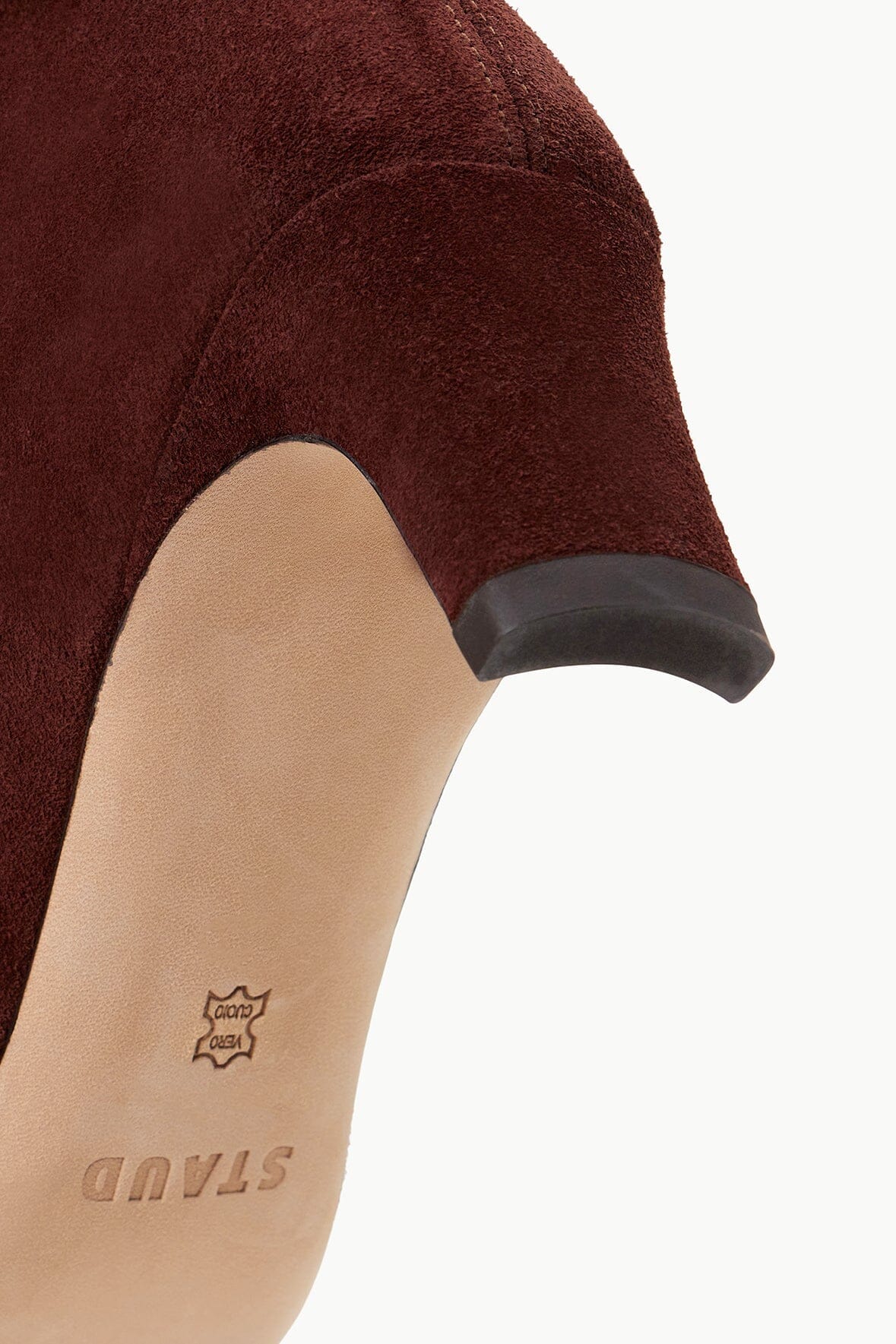 Mahogany suede boot upper close-up with logo on inner lining