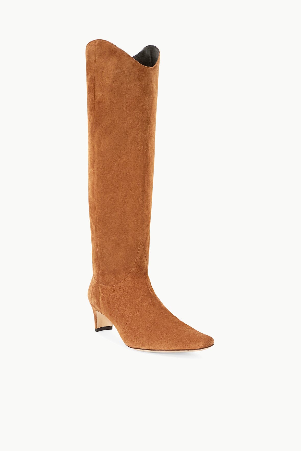 Tan suede tall boot with pointed toe and dark pull-on opening